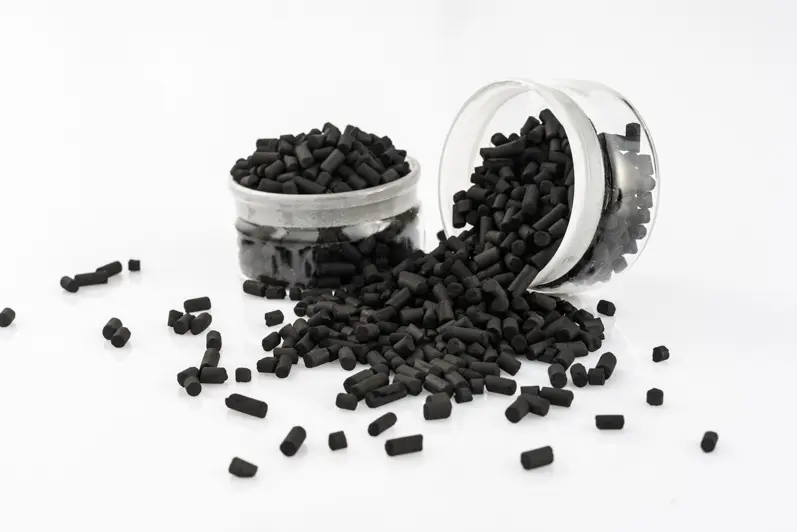 What is the role of activated carbon in food decolorization